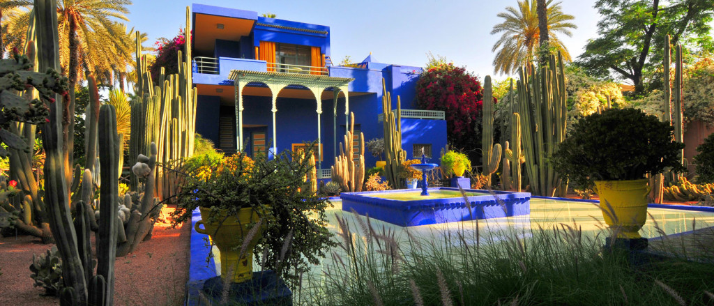 Jardin Marjorelle, Marrakesh, Morocco. The high chroma ultramarine blue painted Art Deco style villa and surrounding gardens of Jardin Marjorelle designed by Jacques Marjorelle in the early 1930′s and lovingly restored by Yves Saint Laurent and Pierre Bergé in 1980